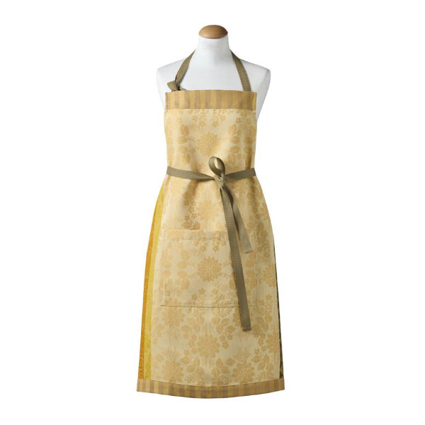 Gold patterned apron on a mannequin against a white background
