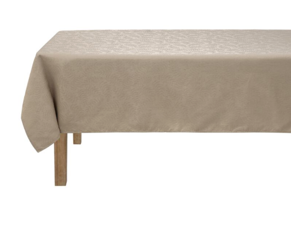Beige tablecloth on a wooden table with a white background
