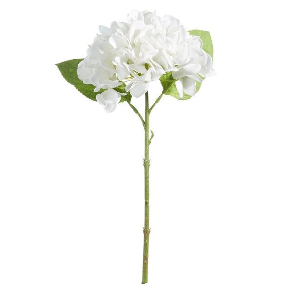 White artificial flower with green leaves on a white background